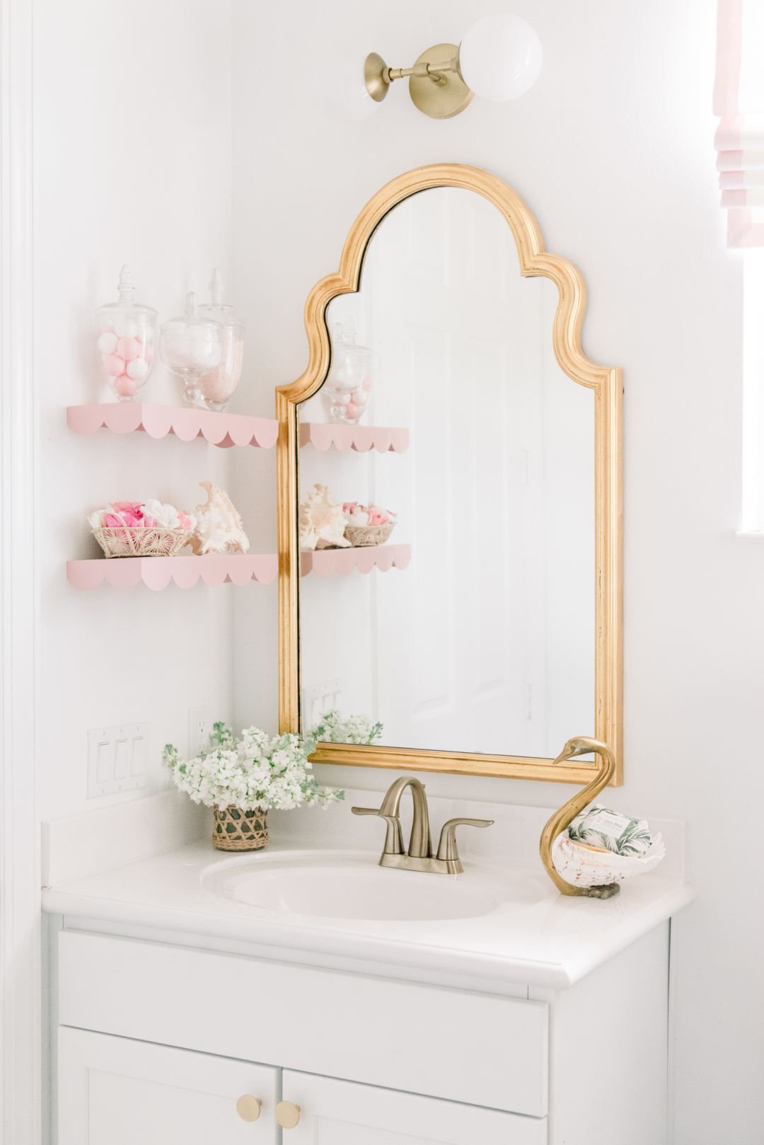 pink white and gold bathroom 